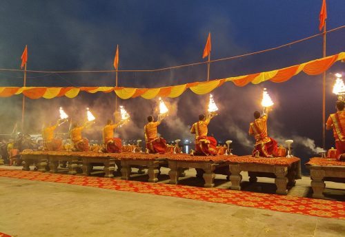 Priests performing the Ganga Aarti on the Varanasi ghats at dusk