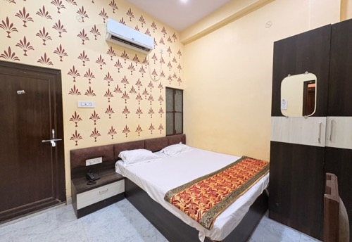 Double Bed Room bedside view, Hotel Shivala Grand