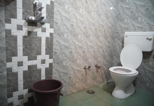 Attached bathroom at Kashi Paradise Stay