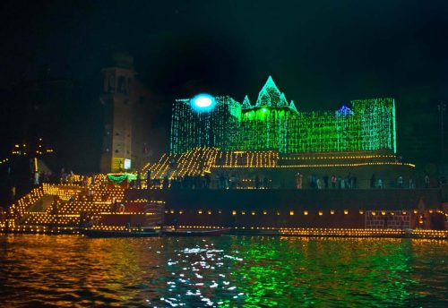 Ghat decorated with lights and flowers for Dev Diwali